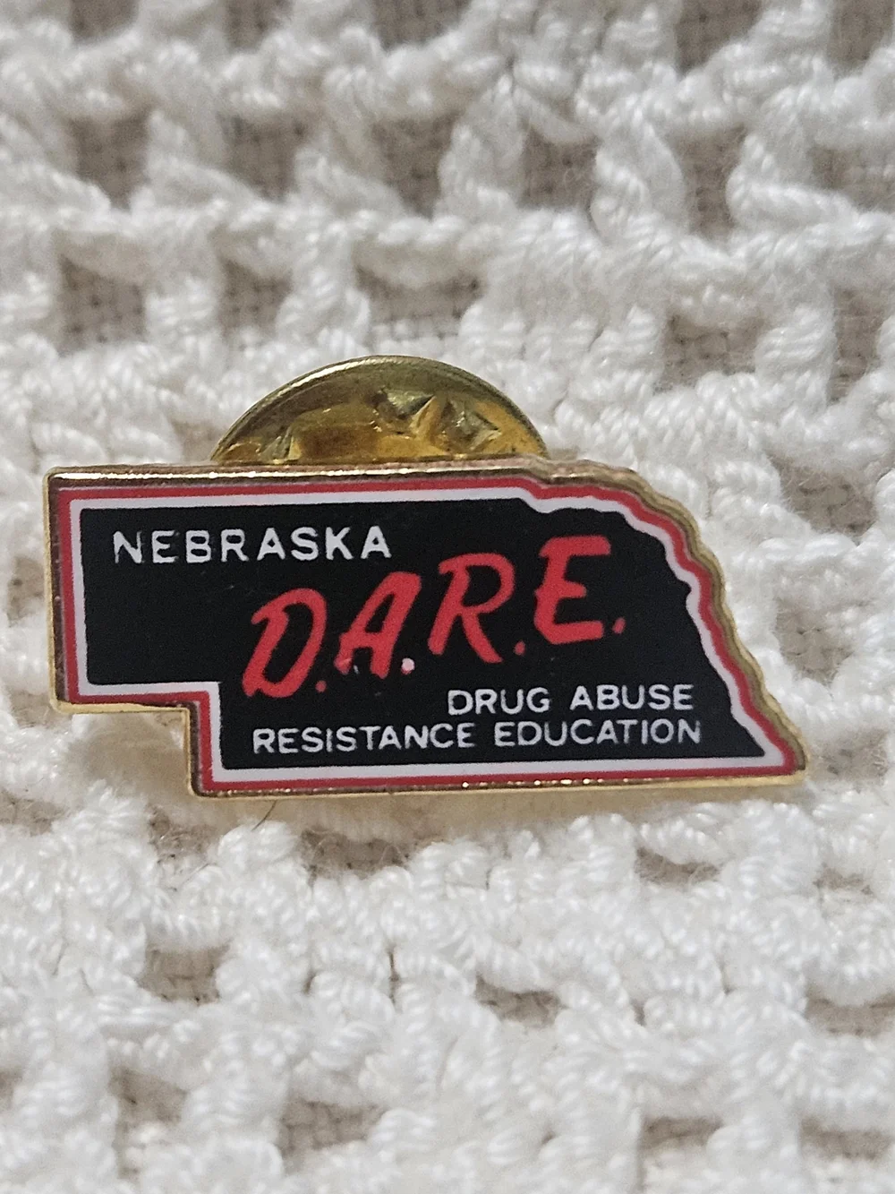Nebraska D.A.R.E. Enamel Pin - Black and Red